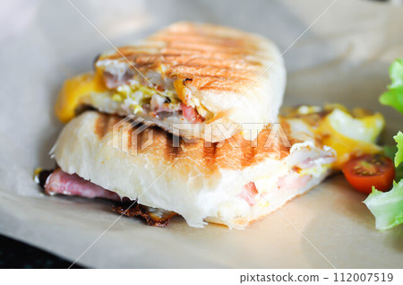 panini, Italian sandwich and salad or ham and cheese sandwich 112007519