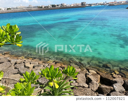 Ishigaki Island cityscape and emerald green sea Ishigaki Island cityscape and emerald green sea 112007821