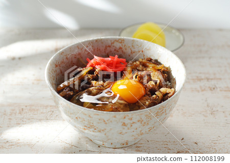 Place raw egg on beef bowl Place raw egg on beef bowl 112008199