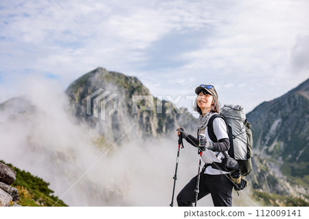 A woman climbing Mt. Tateyama 112009141