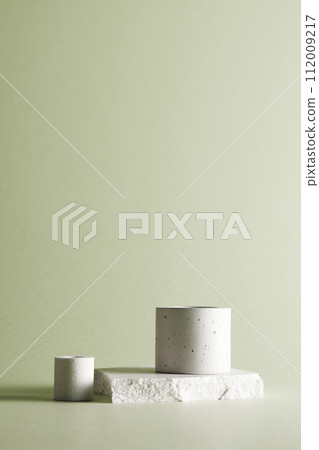 Pastel toned background with broken stones and natural objects. 112009217