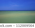 tropical sea and beach with blue sky background 112009564