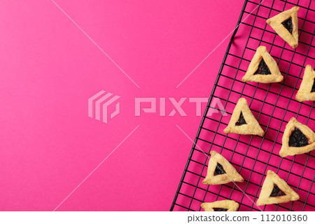 Purim holiday concept, with traditional symbols and decor. Purim holiday concept, with traditional symbols and decor. 112010360