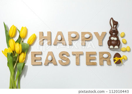 The inscription Happy Easter on a white background The inscription Happy Easter on a white background 112010443