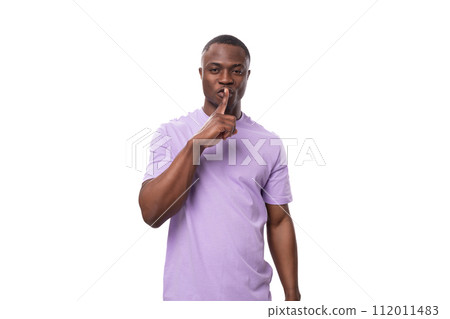 a young American man with a short haircut is dressed in a basic light lilac t-shirt with space for a young American man with a short haircut is dressed in a basic light lilac t-shirt with space for 112011483