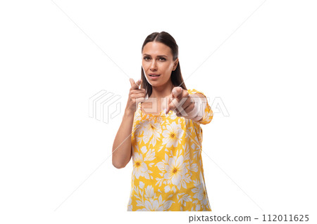 young attractive brunette woman shows her hand to the camera young attractive brunette woman shows her hand to the camera 112011625