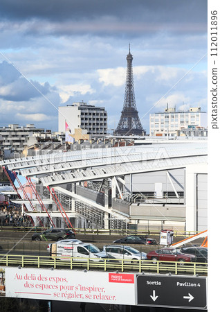 View of the Eiffel Tower from the roofs of the buildings towards Porte de Versailles 112011896