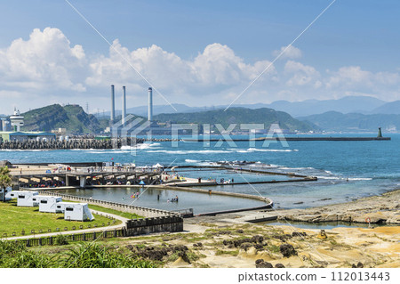 View of the coastal swimming pool at Heping Island Park in Keelung, Taiwan. Keelung Hsieh-ho Power Plant is just in the back. View of the coastal swimming pool at Heping Island Park in Keelung, Taiwan. Keelung Hsieh-ho Power Plant is just in the back. 112013443