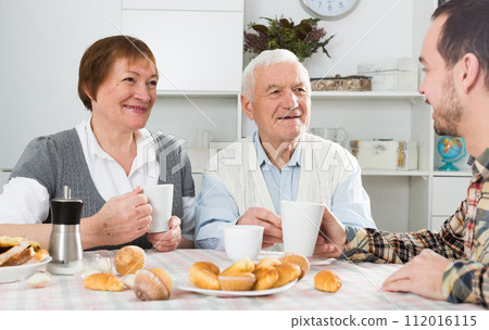 Parents and son enjoying evening Parents and son enjoying evening 112016115