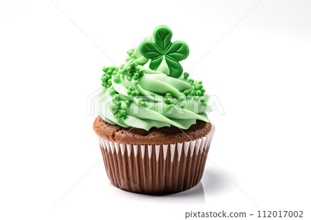 AI-generated content. Single cupcake with green buttercream or cream cheese frosting on the table, St Patrick's day celebration concept, white background 112017002