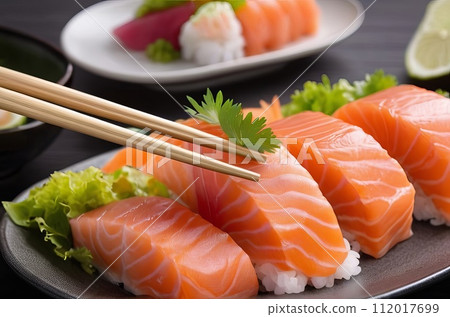 Experience the Art of Savoring: Hands Holding Chopsticks for Fresh Salmon Sashimi. Generative AI. 112017699