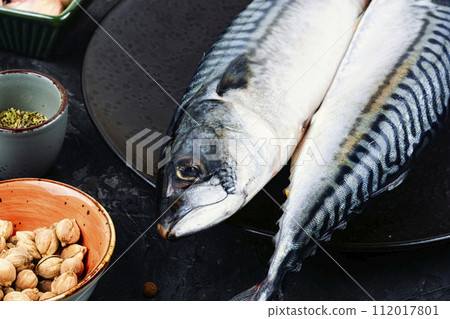 Raw mackerel fish with ingredients. 112017801