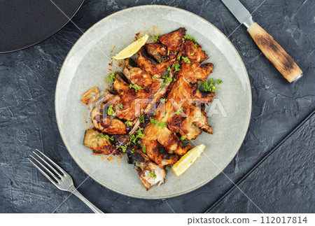 Fried or baked mackerel. 112017814