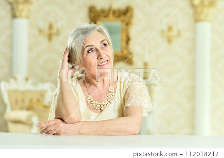 Portrait of beautiful happy senior woman posing Portrait of beautiful happy senior woman posing 112018212