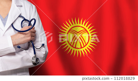 Kyrgyz medicine and healthcare concept. Doctor close up against flag of Kyrgyzstan background 112018829