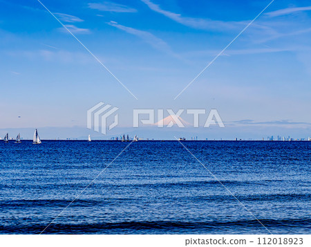 Mt. Fuji across Tokyo Bay from Chiba Inage Coast Mt. Fuji across Tokyo Bay from Chiba Inage Coast 112018923