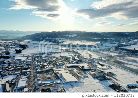 Drone photography: A residential area in a rural town covered in pure white snow Drone photography: A residential area in a rural town covered in pure white snow 112020732
