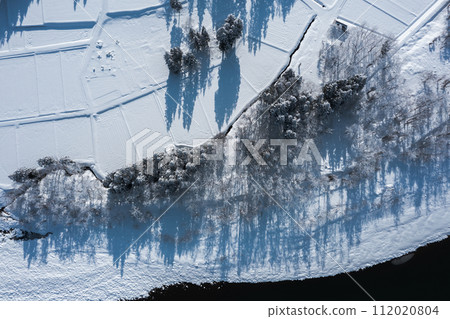 Drone photography: vast natural landscape of snow-covered countryside 112020804