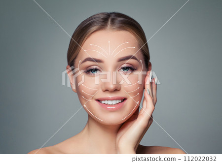Happy woman. Face lift anti-aging lines on young female face. Happy woman. Face lift anti-aging lines on young female face. 112022032