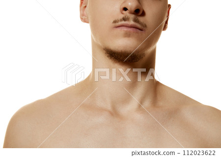 Cropped photo of male mode with beard and mustache posing shirtless against white studio background. Natural beauty people. 112023622