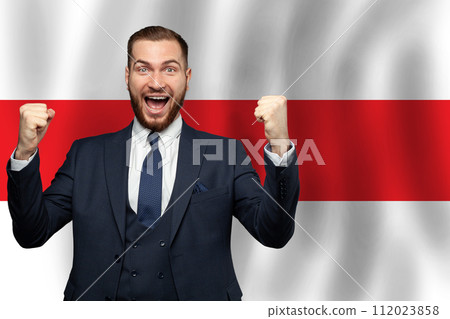 Belarussian happy businessman on the background of flag of Belarus Business, education, degree 112023858