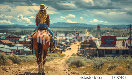 wild west town, Woman dressed as a cowboy on a horse 112024081