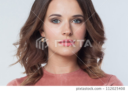 Beauty female model face with makeup and natural clean skin without retouch. Young perfect woman 112025408