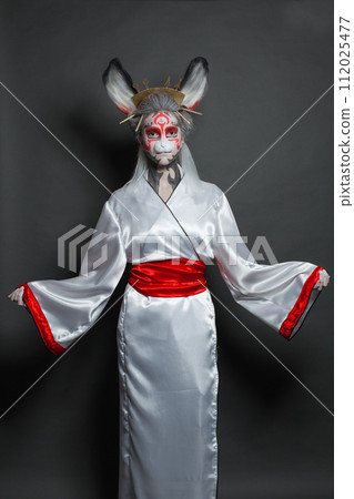 Woman actress with stage makeup in mask and kimono costume. Halloween, carnival, Woman actress with stage makeup in mask and kimono costume. Halloween, carnival, 112025477