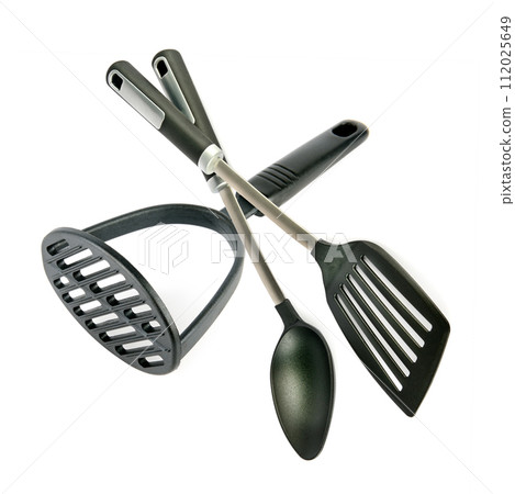 Kitchen utensils, potato masher, spatula and spoon isolated on white . Collage. 112025649