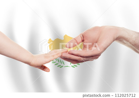 Cyprus baby and parent hands on the background of flag of Cyprus Help, aid, support, charity concept Cyprus baby and parent hands on the background of flag of Cyprus Help, aid, support, charity concept 112025712
