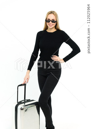 Pretty young woman with suitcase on white background. 112025964