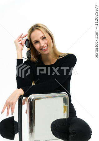 Pretty young woman with suitcase on white background. Pretty young woman with suitcase on white background. 112025977