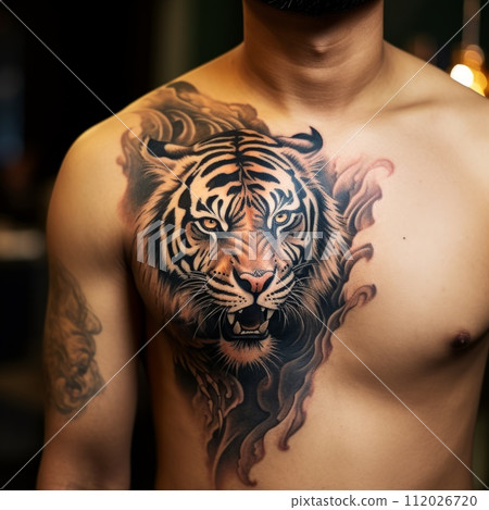 Chest tattoo of a brutal angry tiger. Close up image of a chest with a cool tiger tattoo. Side view of a person with a big colored tattoo of a roaring, aggressive animal on it. AI generated. 112026720