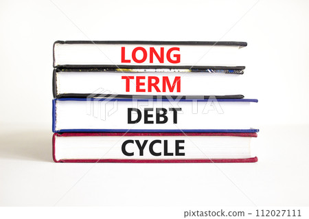 Long term debt cycle symbol. Concept words Long term debt cycle on beautiful books. Beautiful white table white background. Business Long term debt cycle concept. Copy space. 112027111