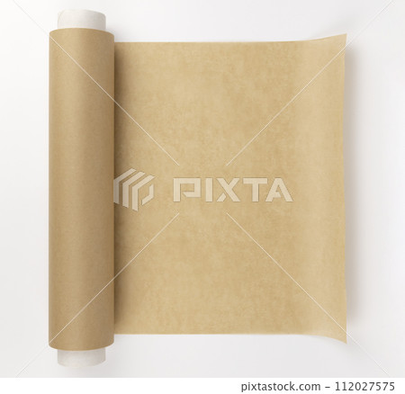 An unrolled roll of parchment paper. Parchment paper for baking. The concept of burning during baking. An unrolled roll of parchment paper. Parchment paper for baking. The concept of burning during baking. 112027575