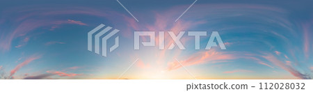 360 panorama of glowing sunset sky with bright Cirrus clouds. Seamless hdr spherical 360 panorama. Sky dome in 3D visualization, sky replacement for aerial drone panoramas. Weather and climate change. 360 panorama of glowing sunset sky with bright Cirrus clouds. Seamless hdr spherical 360 panorama. Sky dome in 3D visualization, sky replacement for aerial drone panoramas. Weather and climate change. 112028032