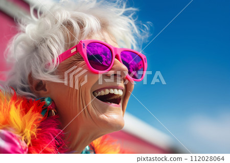 Stylish Senior Woman Enjoying Seaside Stylish Senior Woman Enjoying Seaside 112028064