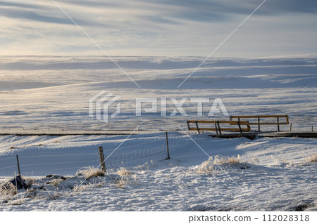 Country covered by snow and a bridge, Iceland 112028318