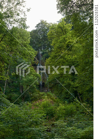 Waterfall Bad Urach at Southern Germany Longexposure. Cascade panorama in Bad Urach Germany is a popular natural attraction and waterfall sight called Uracher Wasserfall . Natural reserve in autumn 112028381