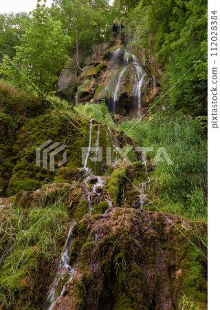 Urach Waterfall in Baden-Wurttemberg, Germany During Summer. Urach Waterfall in Baden-Wurttemberg, Germany During Summer Urach Waterfall in Baden-Wurttemberg, Germany During Summer. Urach Waterfall in Baden-Wurttemberg, Germany During Summer 112028384