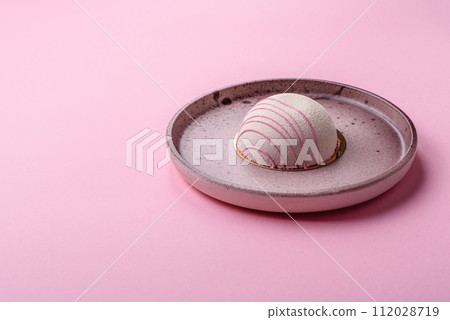 Delicious sweet colorful mochi desserts or ice cream with rice dough and toppings Delicious sweet colorful mochi desserts or ice cream with rice dough and toppings 112028719