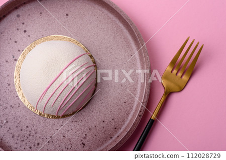 Delicious sweet colorful mochi desserts or ice cream with rice dough and toppings Delicious sweet colorful mochi desserts or ice cream with rice dough and toppings 112028729