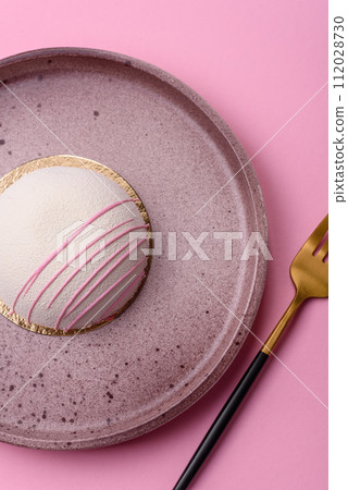 Delicious sweet colorful mochi desserts or ice cream with rice dough and toppings Delicious sweet colorful mochi desserts or ice cream with rice dough and toppings 112028730