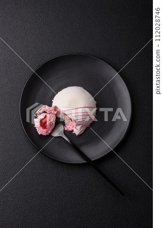 Delicious sweet colorful mochi desserts or ice cream with rice dough and toppings Delicious sweet colorful mochi desserts or ice cream with rice dough and toppings 112028746