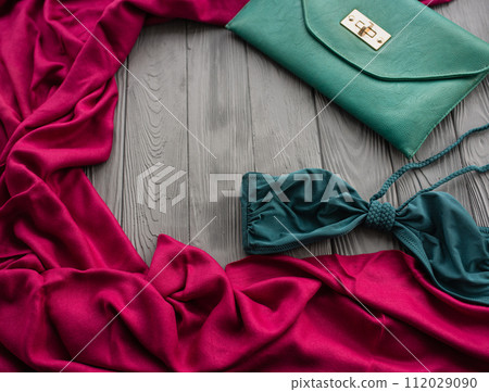 clutch bag turquoise swimsuit bra top. Summer background colorful burgundy template 112029090