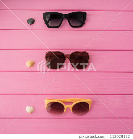 Summer abstract background mockup template sunglasses fashionable with seashells 112029152