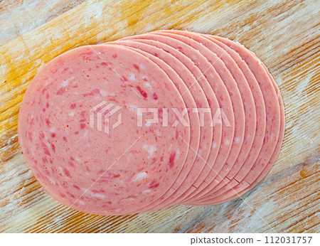 Sliced sausage from chopped pork meat 112031757