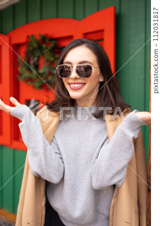 Middle age woman outdoors on Christmas market 112031817