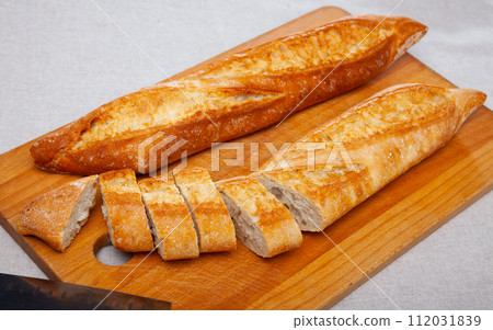 French loaves with chopped slices 112031839