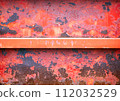 Old and rusty red iron door natural texture 112032529